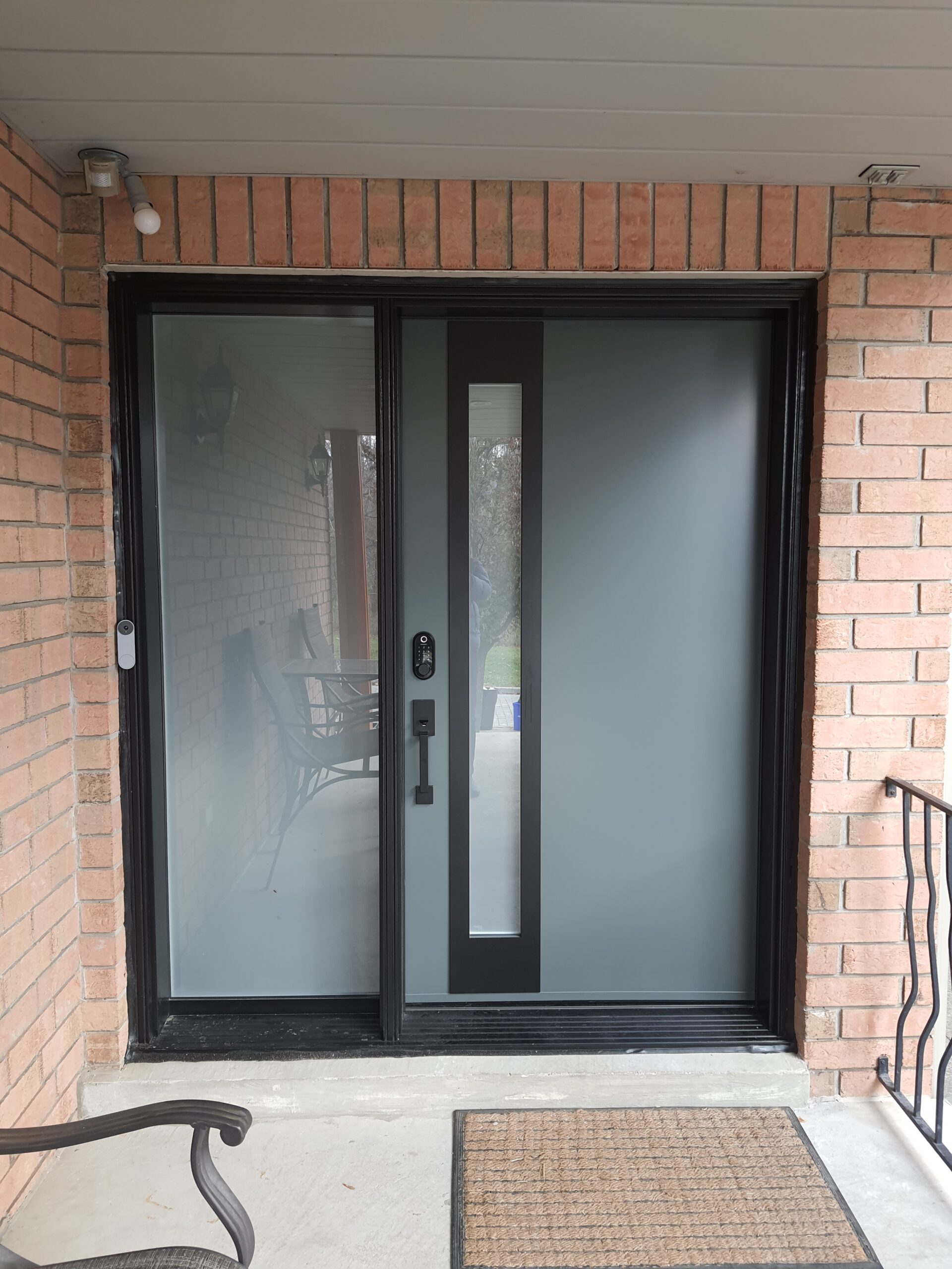 Black And Grey Steel Entry Door Installation 